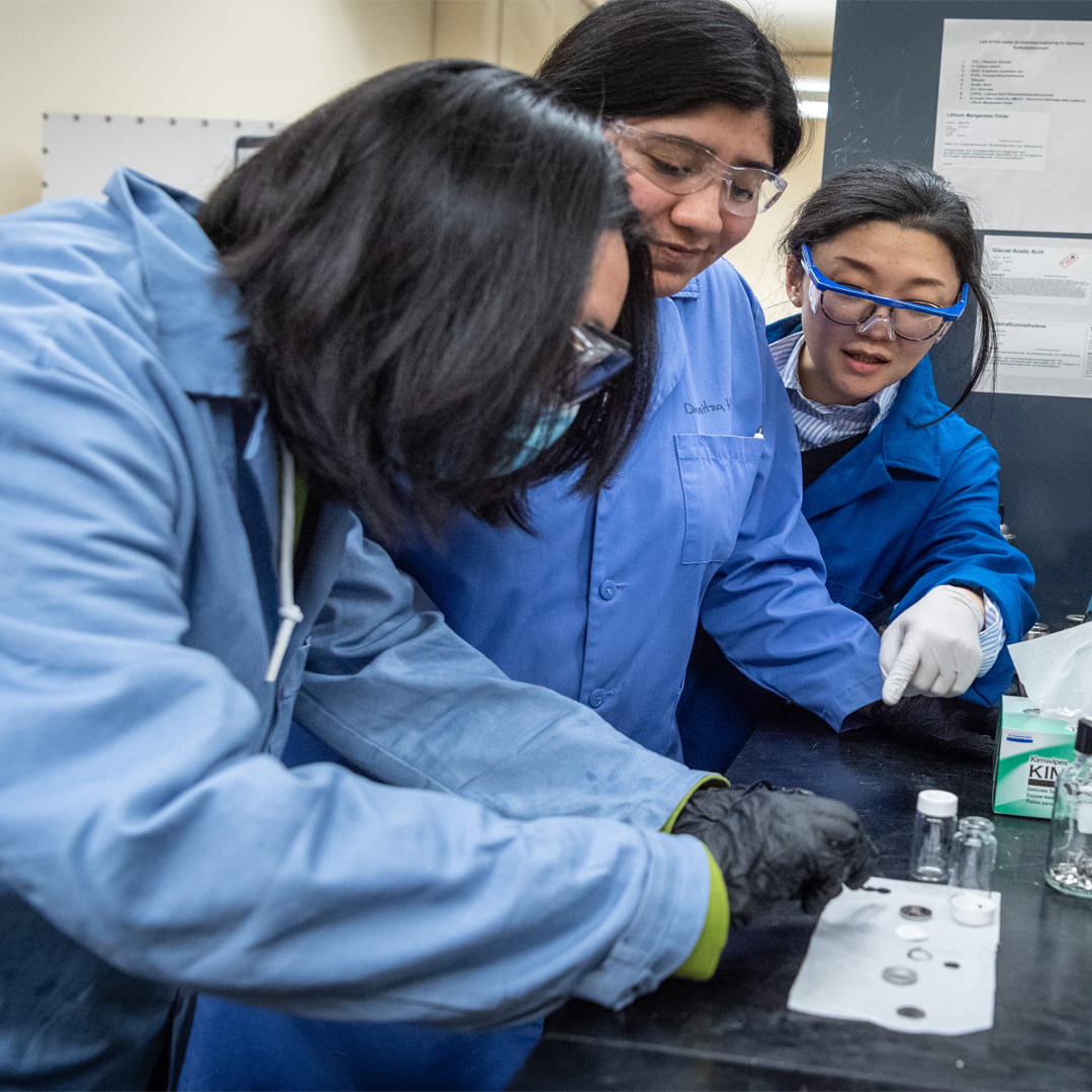 Dahyun Oh, associate professor of materials engineering, in the Energy Materials Lab with students. Photo by Robert C. Bain