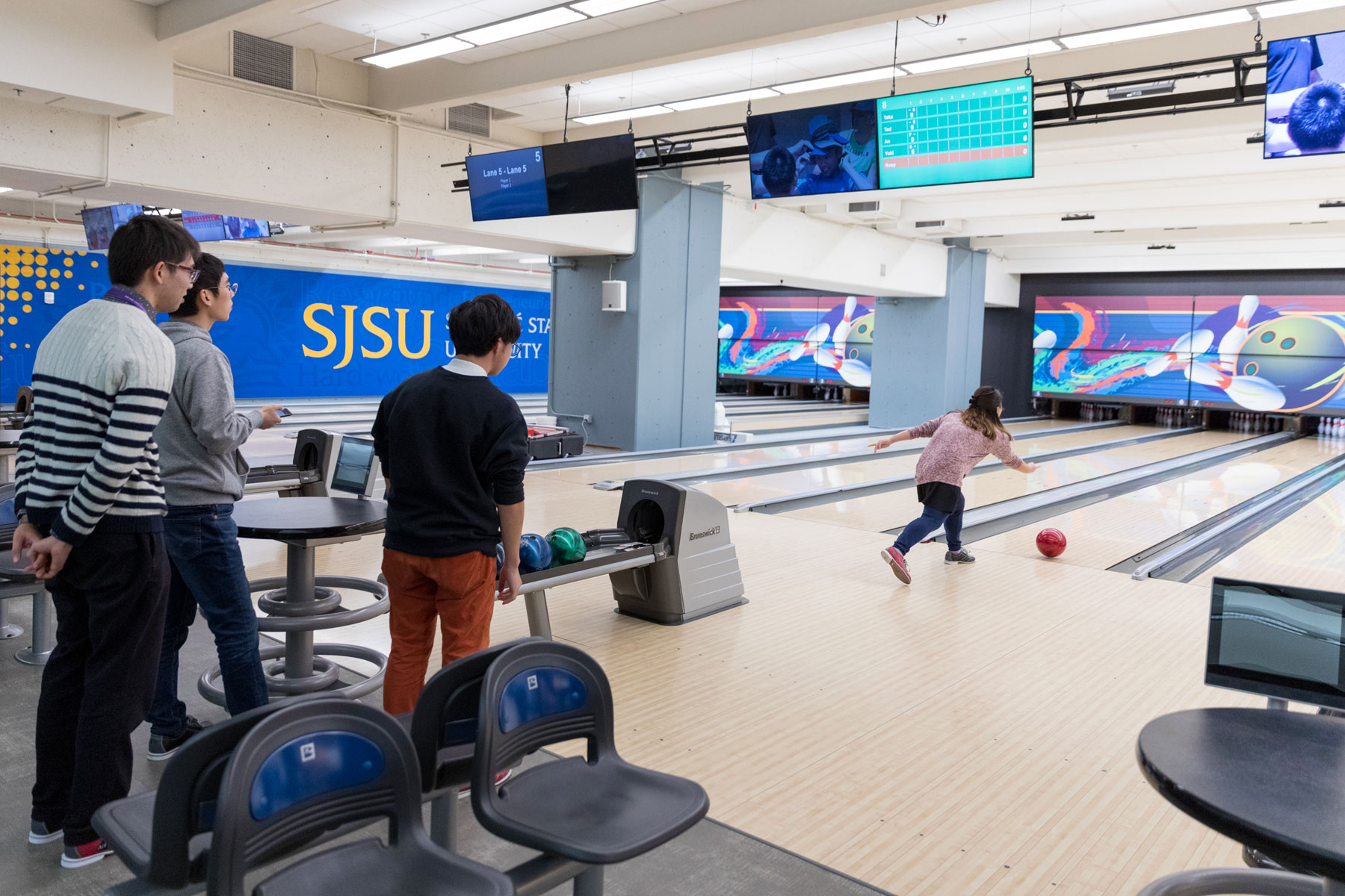 Students bowling at the Bowling Center in the Student Union. 