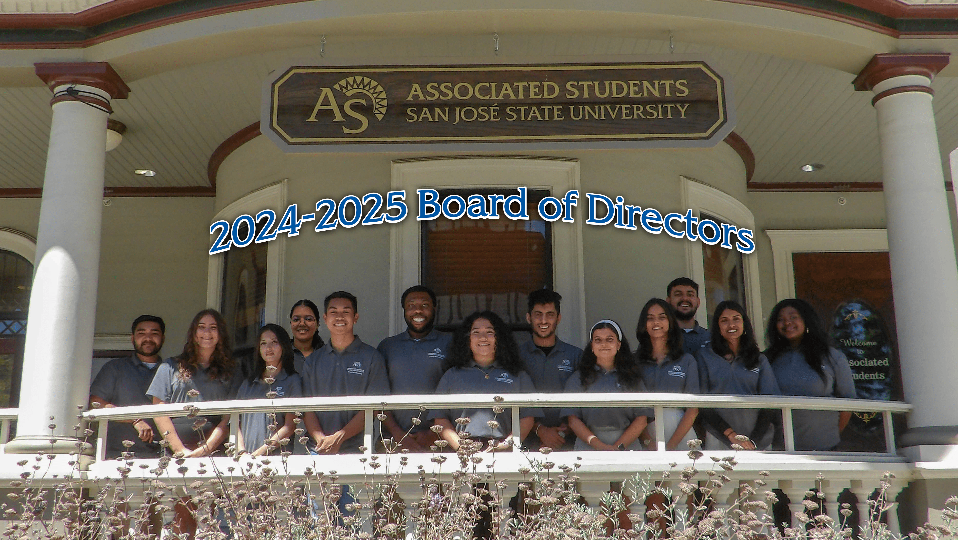 The 2024-2025 A.S. Board of Directors pose in front of the A.S. House.