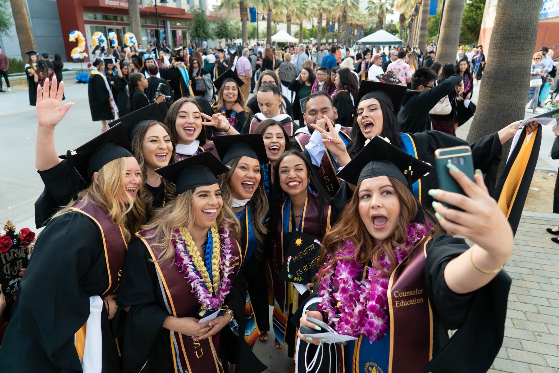 Group of graduates taking a selfie