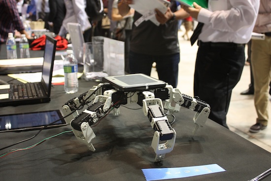 robot or drone sits on a table during a conference